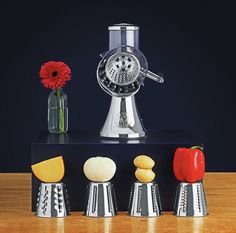 an assortment of kitchen gadgets on a table