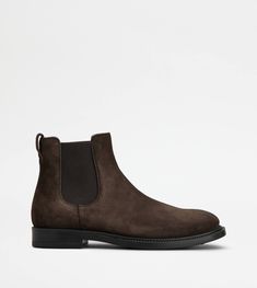 Ankle boots in rich suede with a stamped Tod's monogram, side elastic inserts and a rubber outsole with embossed rubber pebbles. Brown Ankle Boots, Ankle Boots, Online Shop, Monogram, Elastic, Boots