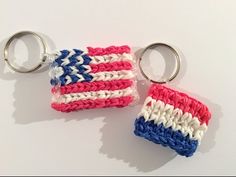 two crocheted keychains sitting next to each other