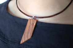 These Unique Necklaces have been made from Solid Wood and are stringed on 3mm Natural Dyed Leather Necklace with Lobster Clasp Closure. MATERIAL:   Pendant: Cherry, Honey Locust, Maple, Oak & Walnut Necklace: 3mm Rounded Leather FINSIH:  Mineral Oil (100% Natural/Organic) FIT SIZE: 16" inches PENDANT DIMENSIONS: NAME OF PIECE:  "All Natural" GIFT SUGGESTION:  I LOVE YOU, GRADUATION, GET WELL, SPECIAL SOMEONE, JUST BECAUSE Honey Locust, Gift Suggestions, Round Leather, Natural Gifts, Leather Necklace, Unique Necklaces, Natural Dyes, Pendant Necklaces, Taiwan