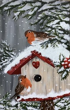 two birds sitting on top of a birdhouse in the snow with hearts hanging from it's roof