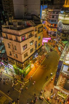 an aerial view of a city street at night