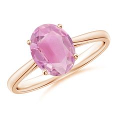 The oval pink tourmaline, prong-set on this 14k rose gold cocktail ring, looks bright and vivid. A dainty leaf-like cutwork adorns the gallery of this solitaire ring for added charm. Rose Gold Cocktail, Yellow Gold Cocktail Ring, Gold Cocktail Ring, Gold Cocktail, Cut Work, Cocktail Ring, Pink Tourmaline, The Gallery, Cocktail Rings