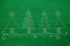 three christmas trees on green fabric with white thread