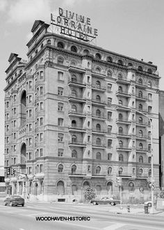 black and white photograph of an old building with the words divine library on top in front of it