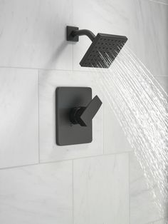 an open shower head with water flowing from it