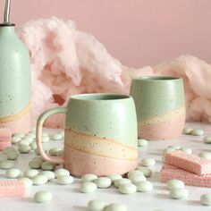 Handmade in the UK, this Cotton Candy inspired pastel green and pink mug is perfect for coffee, tea or hot chocolate. The colourful mug design with contrasting rustic clay makes this a special addition to any kitcheware collection - and why not make your own mug set from the variety of other pastel colours we offer? We love the gorgeous combination of our unique pale pink and mint green glazes, seperated by the exposed flecked stoneware with its rich orange-toned burn created by the kiln-firing. Pastel Green And Pink, Make Your Own Mug, Mint Green Flowers, Pink Mug, Pink And Mint, Green Mugs, Painted Mugs, Kiln Firing, Rose Pastel