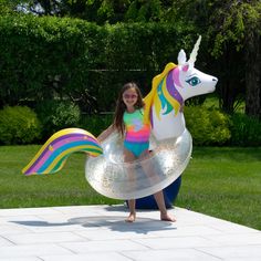 "Find the Swimline 5.6ft. LED Unicorn Glitter Ring at Michaels. com. This LED Unicorn Glitter Ring shines bright and colorful. This LED Unicorn Glitter Ring shines bright and colorful. Filled with unicorn shaped glitter and with LED lights inside the horn, it's sure to bring magical fun to the pool. Who doesn't want to ride a unicorn, even in the pool! Details: Multicolor 5.6ft. x 26.00\" x 36.50\" Requires 2 CR 2032 batteries Weight capacity of 200 lbs. For ages 4 and up | Swimline 5.6Ft LED Un Unicorn Ring, Glitter Ring, Swimming Pool Accessories, Colored Led Lights, Inflatable Pool Floats, Unicorn And Glitter, Mermaid Ring, Swim Ring, Heads And Tails