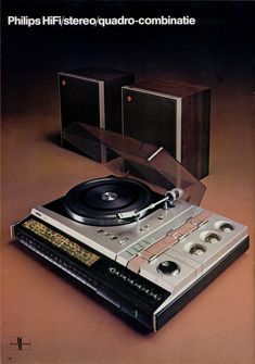 an advertisement for the philips hi - fi stereo confidante, featuring a turntable and speakers