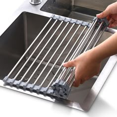 Upgrade your kitchen with the Cheer Collection Over Sink Roll-Up Dish Drying Rack – the epitome of practicality and modern style. This innovative solution offers space efficiency without compromising on aesthetics. Crafted from heavy-duty rustproof stainless steel, this kitchen essential stands the test of time and keeps your workspace clutter-free. The roll-up design is a game-changer, allowing easy storage when not in use. Measuring 20.5" x 14", it fits most kitchen sinks perfectly. But this r Amazon Kitchen Products, Over Sink Dish Drying Rack, Over The Kitchen Sink, Kitchen Sink Rack, Organiser Cucina, Kitchen Dish Rack, Sink Drying Rack, Drying Rack Kitchen, Sink Dish Rack