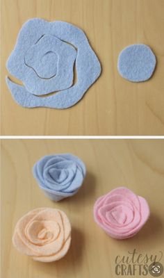 three different types of felt flowers sitting on top of a wooden table