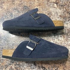 Gorgeous Navy Blue Suede, An Adjustable Buckle, And Super Comfy For Running Around Town. Size 38 Blue Slip-on Clogs With Cork-bed Midsoles, Blue Suede Clogs With Round Toe, Blue Suede Slip-on Clogs, Casual Blue Mules With Leather Footbed, Blue Closed Toe Clogs With Buckle Closure, Casual Blue Mules With Cushioned Footbed, Casual Blue Mules With Flat Heel, Casual Blue Flat-heel Mules, Blue Suede Slip-on Mules