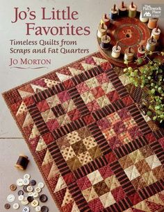 the cover of jo's little favorites quilt book with thread spools