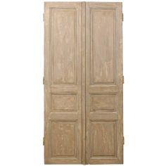 an old wooden double door on a white background