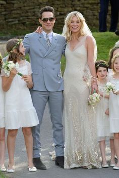 Model Weddings Dresses & Photos | British Vogue V Neck Wedding Dress, Kate Moss Wedding, 2011 Fashion Trends, Jamie Hince, Celebrity Wedding Photos, Kate Moss Style, Best Wedding Guest Dresses, Celebrity Wedding Dresses, Stylish Celebrities