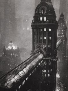 an old black and white photo of a train on the tracks in new york city