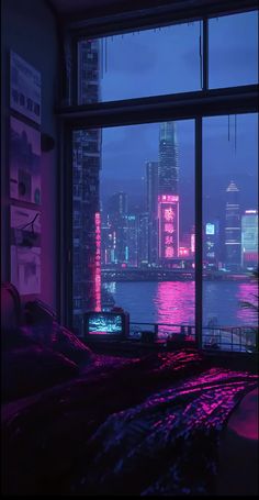 the city skyline is lit up in pink and purple lights from an open window at night