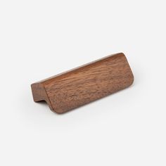 a wooden handle on a white background