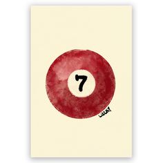 a red pool ball with the number seven painted on it's side in black ink