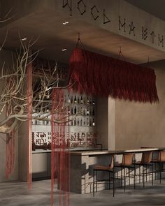 the bar is decorated with red fringes and chairs