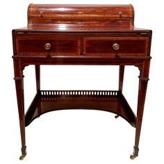 an antique wooden desk with two drawers on one side and a drawer on the other