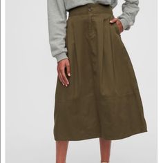 This Gap Amber Green High Rise Khaki Midi Skirt Is Adorable And Suitable For All Seasons! 28” 28.5“ Waist Size 4 >>>Fits Like 4-6. Banded Waist With Button-Closure, Zip Fly Front Slant Pockets 100% Cotton Machine Wash Imported Please Note: Details Including Fabric, Construction, And Measurement Are Subject To Slight Variations From The Pictured Item. Open To All Serious Offers Please Review All Images. No Returns. Listed Item Only. Accessories Not Included. See My Closet For More Great Brands & Casual Cotton Skirt By Gap, Gap Casual Cotton Skirt, Spring Cotton Skirt By Gap, Casual Lined Skirt Bottoms By Gap, Khaki Midi Skirt, Olive Green Skirt, Fabric Construction, Green Skirt, Lovely Things