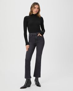 This black long sleeve high neck top is made from an incredibly soft and comfortable ribbed knit material with a flattering stitch detail at the waistline. Pair the Raisa Top with any shade of denim in your closet. High Neck Outfit, Petite Flare Jeans, High Neck Long Sleeve Top, Black Lotus, Soft Jeans, Breaking In, Cropped Flare Jeans, Black Flare, Black Long Sleeve Top