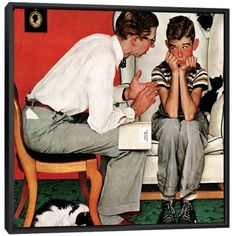 two boys sitting on a chair with their hands clasped to each other and a cat laying next to them