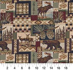 the moose and elk are depicted in this quilt