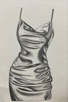 a pencil drawing of a dress on paper