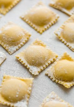 small ravioli shells covered in powdered sugar