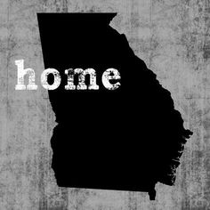 the state of indiana with the word home painted on it's side in black and white