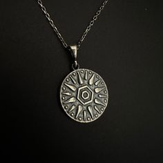 "Little Glowing Sun Symbol Pendant, Ancient Sun Charm Necklace, 925 Sterling Silver Sun Necklace, Mythological Talisman, Meditation Jewelry Little Glowing Sun Charm 𓁿 Glowing Sun \"Charm of Relief\" is here to relieve your mind and will whisper magical words to your heart - Spiritual Collection Item Details, ✔️ Made of certified 925k sterling silver ✔️ Oxidized Silver ✔️ Diameter of the pendant is 1.6 cm (0.63 inches) ✔️ You can order the pendant with chain or with no chain. ✔️ Free, Express, and Insured Shipping ✔️ Minimalist design You can check out more jewelry from NorseJewelryArt via following link: https://www.etsy.com/shop/NorseJewelryArt * All jewelry comes in well packaged, beautiful jewelry boxes ready to gift * All items and chains are made of 925 sterling silver or natural gem Antique Silver Etched Sterling Silver Necklace, Spiritual Sterling Silver Necklaces With Oxidized Finish, Spiritual Sterling Silver Necklace With Oxidized Finish, Artisan Sterling Silver Necklaces With Oxidized Finish, Artisan Sterling Silver Necklace With Oxidized Finish, Spiritual Antique Silver Medallion Necklace, Antique Silver Spiritual Pendant Necklace, Bohemian Sterling Silver Engraved Necklaces, Symbolic Handmade Medallion Pendant Necklace