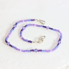 Amethyst Purple Crystal Plum Seed Beaded Wrap Anklet Or Bracelet Handmade Item Length: 9.5 Inches Materials: Seed Beads And Crystals Gemstone: Amethyst Closure: Hook Jewelry Style: Minimalist Amethyst Is A Meditative And Calming Stone Which Works In The Emotional, Spiritual, And Physical Planes To Promote Calm, Balance, And Peace. It Is Also Used To Eliminate Impatience. It Is One Of The Stones That Was Most Highly Prized In The Ancient World, And Continues To Be Prized By Many People Today. #An Plum Seed, Purple Beaded Bracelets, Jewelry Stacking, Anklet For Women, Ancient World, Stacked Jewelry, Purple Crystal, Jewelry Style, Beaded Wraps