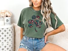 Elevate your St. Patrick's Day ensemble with our Comfort Colors moss green shirt adorned with a boho floral shamrock original design, making it the perfect choice for celebrating the luck of the Irish in style. Embrace the charm of the Emerald Isle with this lucky t-shirt featuring a delicately crafted four-leaf clover motif intertwined with vibrant floral patterns, sure to bring a touch of whimsy to your festivities. Whether you're joining a parade or raising a pint at your favorite pub, this s San Jose, Lucky Shamrock, Green Shamrock, St Patricks Day Shirt, Shamrock Shirt, St Patrick Day Shirts, Emerald Isle, Luck Of The Irish, Four Leaf