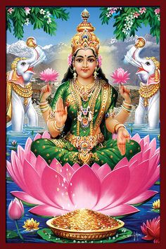 the hindu goddess sitting on top of a lotus