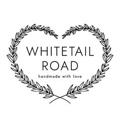 the whitetail road logo with an olive wreath in the shape of a heart and words handmade with love