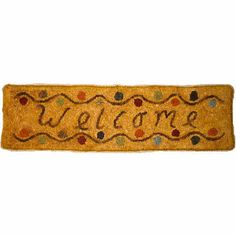 a welcome mat with the word welcome on it