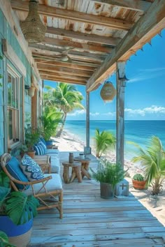 a porch with chairs and potted plants on the deck next to the ocean,