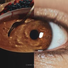 an eye is shown with food in the background and on top of it are berries