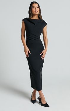 Get ready to turn heads in the stunning Carmilette Midi Dress. This black slip dress is perfect for any occasion, whether you're heading to work or hitting the town with your squad. The cowl neck adds a touch of elegance and sophistication, while the ruched jersey fabric hugs your curves in all the right places. With its short sleeves and midi length, this dress strikes the perfect balance between sexy and sophisticated. Made from high-quality nylon jersey material, it's comfortable enough for a Business Dresses Women, Black Midi Formal Dress, Black Dress For Graduation, Midi Ruched Dress, Black Formal Midi Dress, Graduation Inspiration, High Neck Black Dress, Chic Dressing, Evening Midi Dress