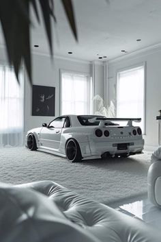 a white car is parked in the living room