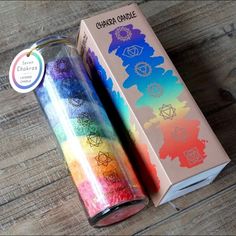 the chakra candle is in its box and next to it's wrapper