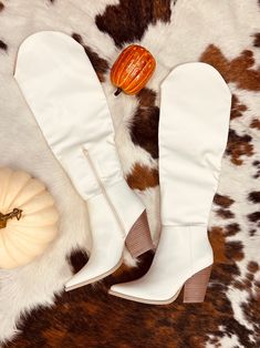 Let the lights dim and show off your style in these knee-high, white embroidered stitched cowboy boots. The 3.5 heel and 15.75 in total height give you the perfect mix of comfort and class - now all you need is somewhere to dance the night away!  These boots run small so I would size up!! Dim Lighting, Dancing Queen, The 3, All You Need Is, Knee High Boots, High Boots, Cowboy Boots, Knee High, Dancing