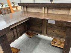 an office desk made out of pallets and wood