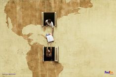 two people looking out the window of an old building, one holding a sign and the other reaching for something