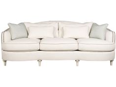 a white couch with two pillows on it's back and one arm facing the camera