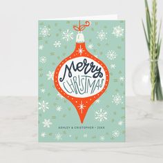 a merry christmas ornament card with the words merry and snowflakes on it