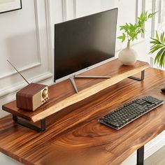 Minimalistic home office space with sleek computer monitor on wooden stand, retro radio, verdant plants, and stylish keyboard. Industrial Pipe Furniture, Whiskey Barrel Furniture, Cozy Office, Shelf Black, Live Edge Furniture, Barrel Furniture, Solid Wood Desk, Pipe Furniture, Desk Shelf