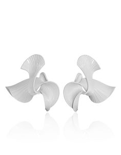 Designed to resemble iris flowers, these LADA LEGINA's 3D Printed earrings will easily add detail to any ensemble. The self-closing ear studs are suitable for pierced ears and are similar to the clip-on earring stylesMaterial: 3D Printed in Nylon3D Printed in the USA 3d Print Jewelry, 3d Printer Jewelry, Futuristic Jewelry, 3d Printed Earrings, Printed Earrings, 3d Printed Jewelry, Printed Jewelry, Iris Flowers, Diy Earrings